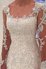 A-line Round Neck Long Sleeve Floor Length Tulle Applique Wedding Dress