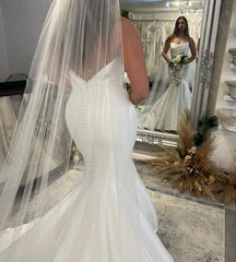 Charming Sleeveless Mermaid Wedding Dress With Ruffles Long